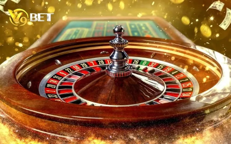 Roulette V9BET | Luật Chơi, Cách Cược & Bảng Payout 2 Vòng Roulette có ô số 0 màu xanh và bàn cược phía sau